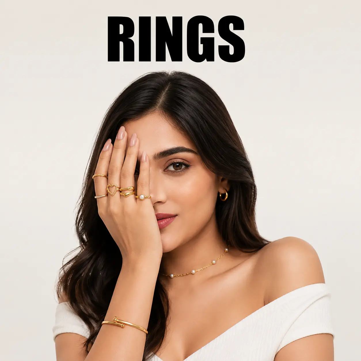"Women's gold rings collection featured on a Korean-Indian mixed fashion model with minimalist luxury jewelry styling.